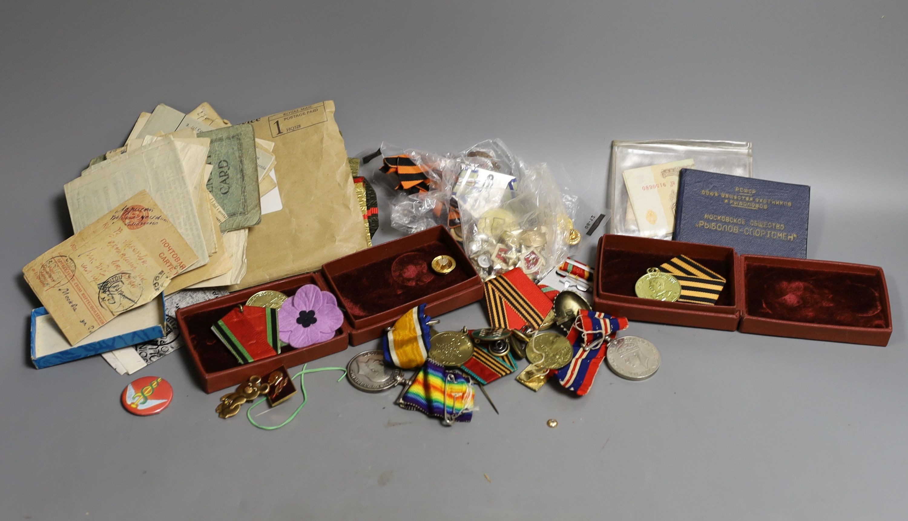 Three pairs of Polish Army shoulders pads, four U.S.S.R, Jubilee Medals, buttons, brooches and WWI medal group to Pte. G. Huggett, Royal Sussex Regiment, a WWII war medal and a USSR WWII 'Stalin' Medal.